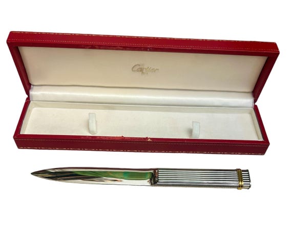 A Vintage Must De Cartier Silver and Gold Metal Letter Opener in