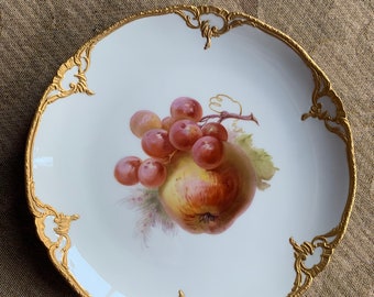 Antique KPM Berlin porcelain plate with hand-painted fruit and raised gilded border