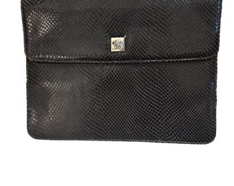a vintage Gianni Versace snakeskin handbag