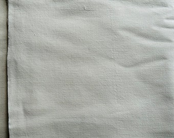 A vintage 1930’s unused French métis linen plain white farmhouse sheet with a white corner monogram L D.
