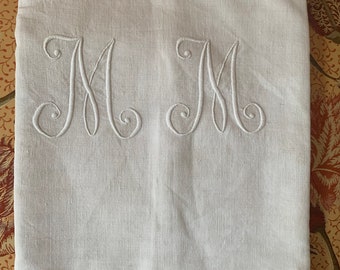An antique French white métis linen embroidered monogrammed sheet circa 1900