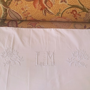 An Art Déco antique French white cotton embroidered monogrammed sheet circa 1920’s