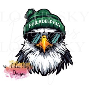 Könnte beinhalten: Ein Cartoon-Glatzkopfadler mit grüner Sonnenbrille und einer grünen Mütze mit dem Wort "PHILADELPHIA" darauf.