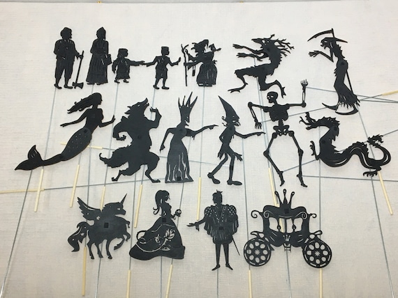 Puppets for the Shadow Theater. the Set Consists of 17 Characters
