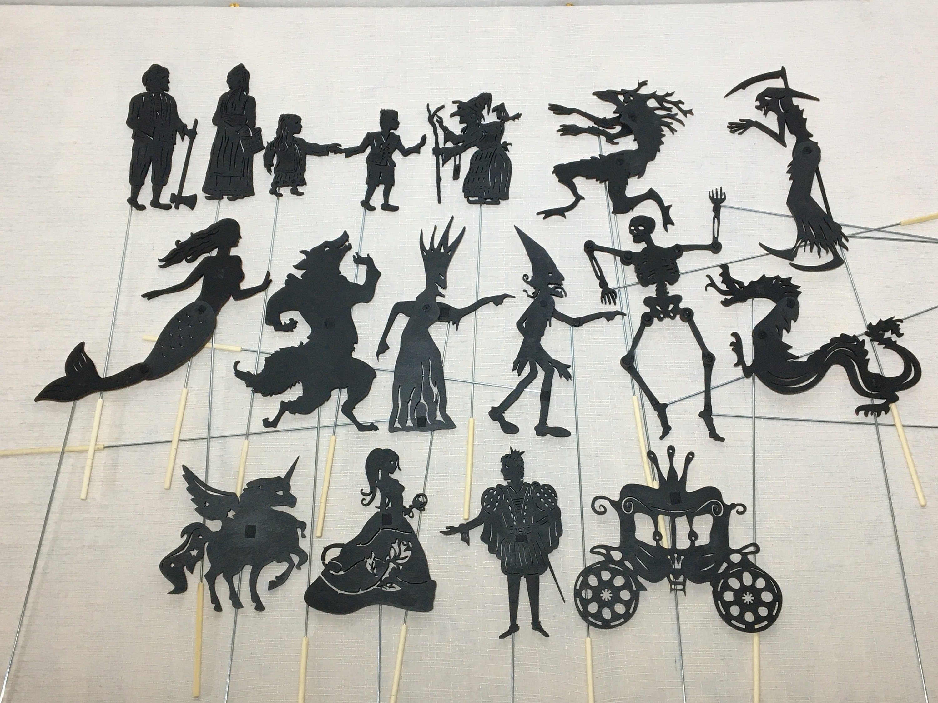 Puppets for the shadow theater. The set consists of 17 characters of different genres and controls, static and moving.