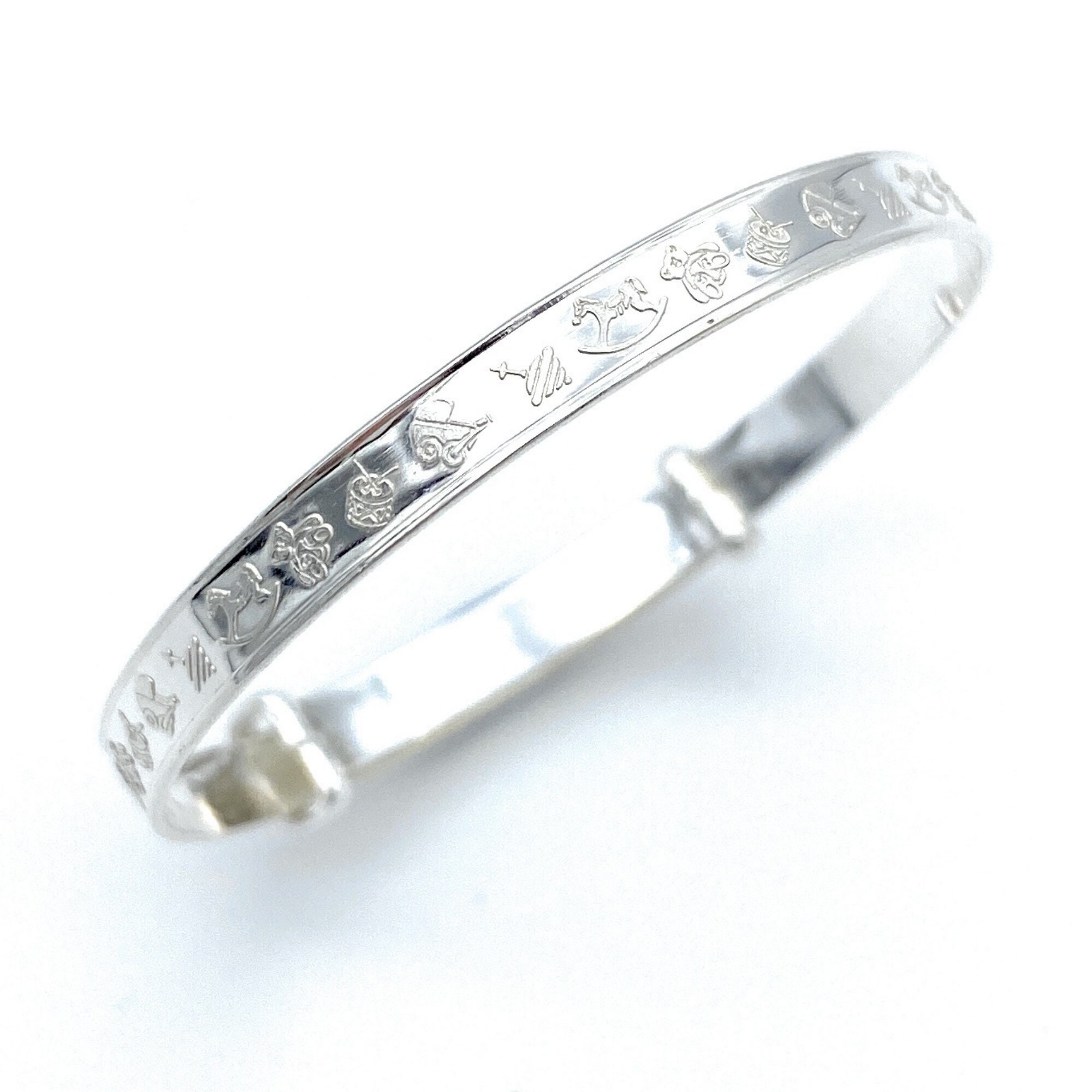 Silver kangan hotsell for baby girl