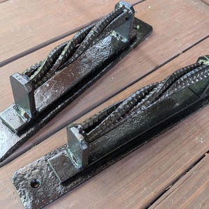 Hand-forged and fabricated twisted rebar door pull great for barns, sheds, doors, and more, industrial rustic iron handle