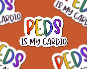 Puede incluir: Adhesivo blanco con el texto "PEDS IS MY CARDIO" en colores del arcoíris. La palabra "PEDS" está en letras grandes y en negrita, y la frase tiene un estilo juguetón y manuscrito. Varios adhesivos están dispersos sobre un fondo naranja.