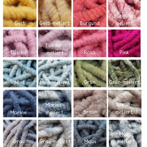 May include: A collection of 15 different colors of yarn, including yellow, pink, green, blue, brown, and gray. Each color is shown in both a solid and a variegated version. The yarn is arranged in a grid pattern.