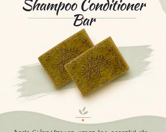 May include: Two rectangular olive green shampoo conditioner bars featuring an embossed sun and moon design with decorative scrollwork borders. The text reads Shampoo Conditioner Bar, Apple Cider Vinegar, green tea, essential oils, and Raecheliris.