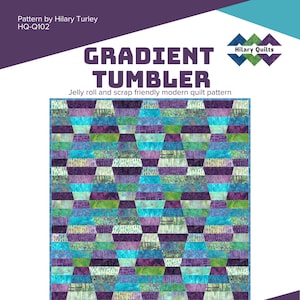 May include: A quilt pattern called "Gradient Tumbler" by Hilary Turley. The pattern is for a modern quilt that uses a jelly roll or scrap fabric. The quilt is made up of a series of colorful, geometric shapes in shades of blue, green, and purple. The pattern is available in sizes for a runner, crib, throw, twin, and queen/king bed.