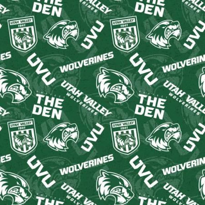 May include: Green and white fabric with a repeating pattern of a wolverine mascot, the words "Utah Valley Wolverines", and "The Den".