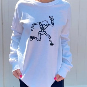 white skeleton long sleeve tee + free skeleton sticker with purchase