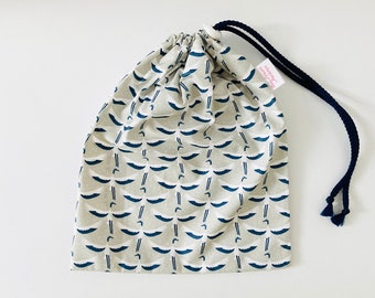 Waterproof bag for wet swimsuits in coated cotton fabric with small Japanese crane patterns