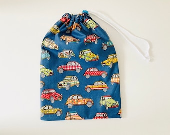 Waterproof bag for wet swimsuit in blue coated cotton fabric with 2CV car motifs