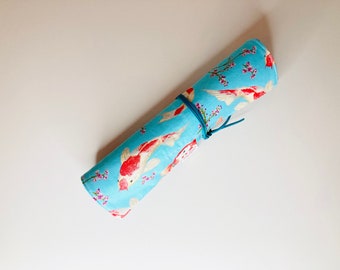 Brush case in sky blue koi carp cotton fabric, interior in sky blue linen.