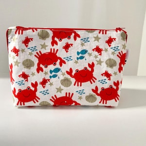 Borsa da toilette in tessuto di cotone bianco con motivi a granchio rosso