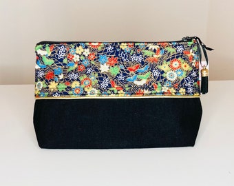 Toiletry bag in black cotton fabric and multicolored and gold Japanese fabric enhanced with a gold bias