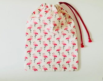 Waterproof bag for wet swimsuit in coated cotton fabric with flamingo patterns