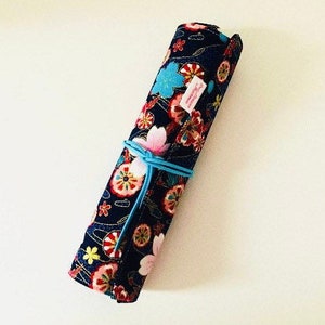 Makeup or paint brush kit in navy blue Japanese fabrics with flowers and matching navy blue cotton fabrics. image 1