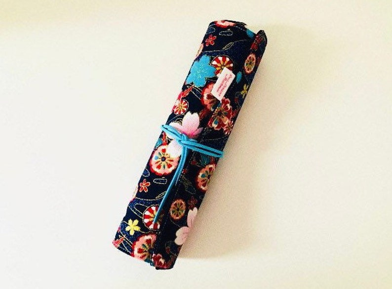 Makeup or paint brush kit in navy blue Japanese fabrics with flowers and matching navy blue cotton fabrics. image 1