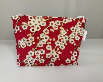 Makeup bag in red Japanese fabric with white flowers