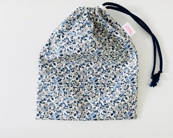 Waterproof bag for wet swimsuit in coated cotton fabric with liberty patterns, small blue flowers