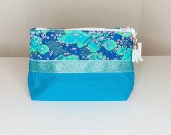 Makeup bag in turquoise blue cotton fabric and Japanese fabric with small cherry blossoms