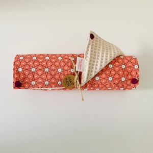 Washable cotton fabric roll in apricot with Japanese flower and beige honeycomb patterns