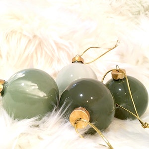 Boho marbled ornaments in forest green