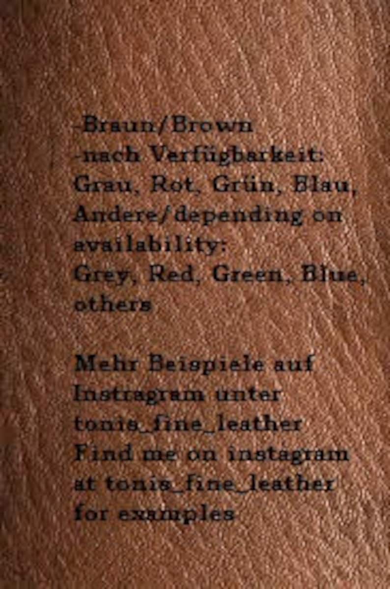 May include: Close-up of brown leather texture with text in German and English. The text lists color options: Grey, Red, Green, and Blue. Additional text directs viewers to Instagram for more examples.