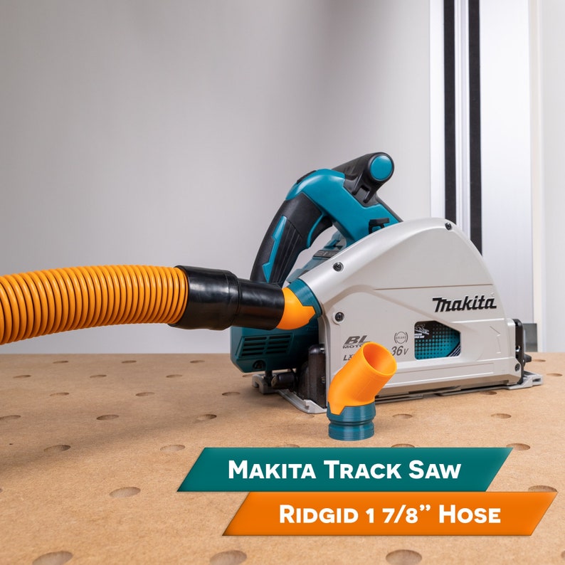 May include: A Makita track saw with a 36V battery and a Ridgid 1 7/8" hose attached to the dust port. The saw is sitting on a pegboard surface.