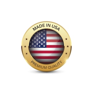 K&ouml;nnte beinhalten: Goldenes Abzeichen mit der amerikanischen Flagge und dem Text "Made in USA Premium Quality".