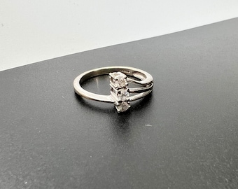 Stylish Three Stone Brilliant cut Diamond Ring in White 9ct Gold Size N