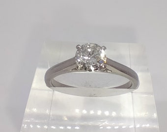 Stunning half carat brilliant cut white diamond and platinum solitaire wedding / engagement ring size L
