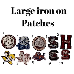 May include: A collection of large iron-on patches featuring various university logos and mascots. The patches include a bulldog, tiger, building, and the letters "H", "S", and "N". The text "Large iron on Patches" is displayed at the top.