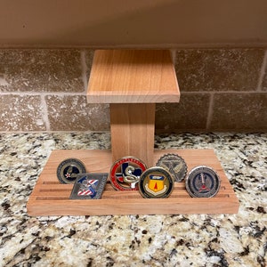 Podium coin rack