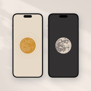 May include: Two smartphones with celestial-themed wallpapers. One has a beige background with a sun design, the other a black background with a moon illustration. The phones are displayed next to each other.