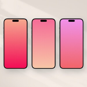 Può includere: Tre smartphone con bordi neri e schermi con sfumature di colore. Gli schermi passano dal rosso all'arancione, dall'arancione al rosa e dal rosa al viola. I telefoni sono su una superficie beige chiaro.