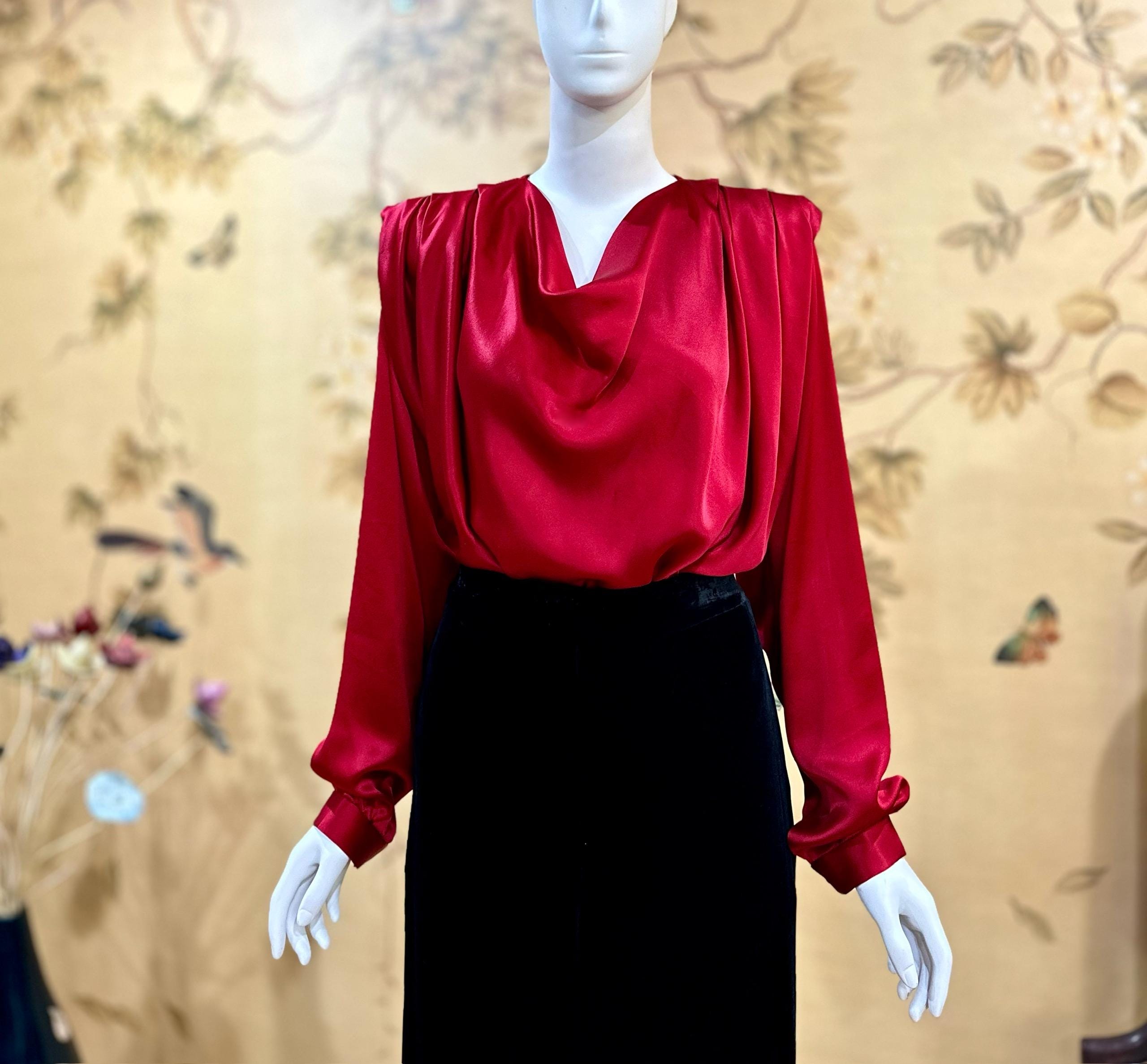 Luxurious red silk blouse with a draped neckline and soft gathers-elegent, timeless, and effortlessly chic
