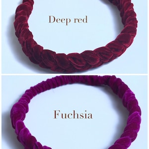 May include: Two velvet headbands, one deep red and one fuchsia. Both headbands are braided and have a stretchy fit.