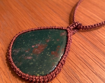 Bloodstone Macrame Pendant wrapped in mahogany waxed cord