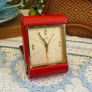Oris 8-Day Mechanical Travel Alarm Clock • 1950s Red Leatherette Folding Case