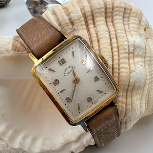 1960s Favre-Leuba 17 Jewels Swiss Made Ladies Watch With Rectangular Curved Dial Worn Leather Band Running Well Keeping Time Geneve
