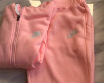 pink nike sweat suits