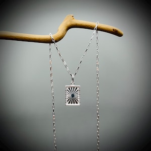 Sterling Silver Sunburst Pendant Necklace: Diamond Cut Charm