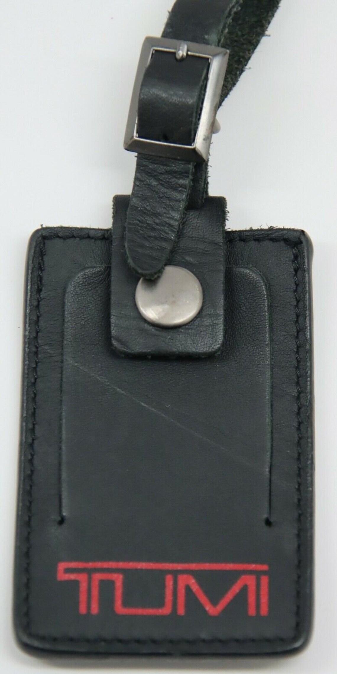 tumi bag name tag