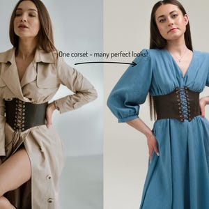 a woman in a blue dress and a woman in a trench coat