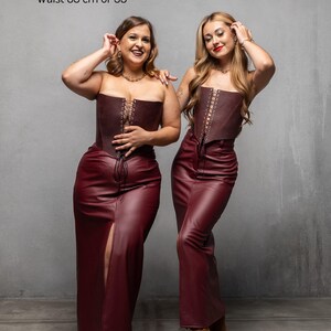 a couple of women standing next to each other