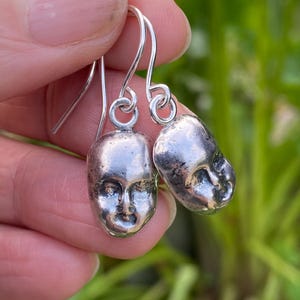 Doll face Earrings dangly cast from recycled Sterling Silver from a found doll head